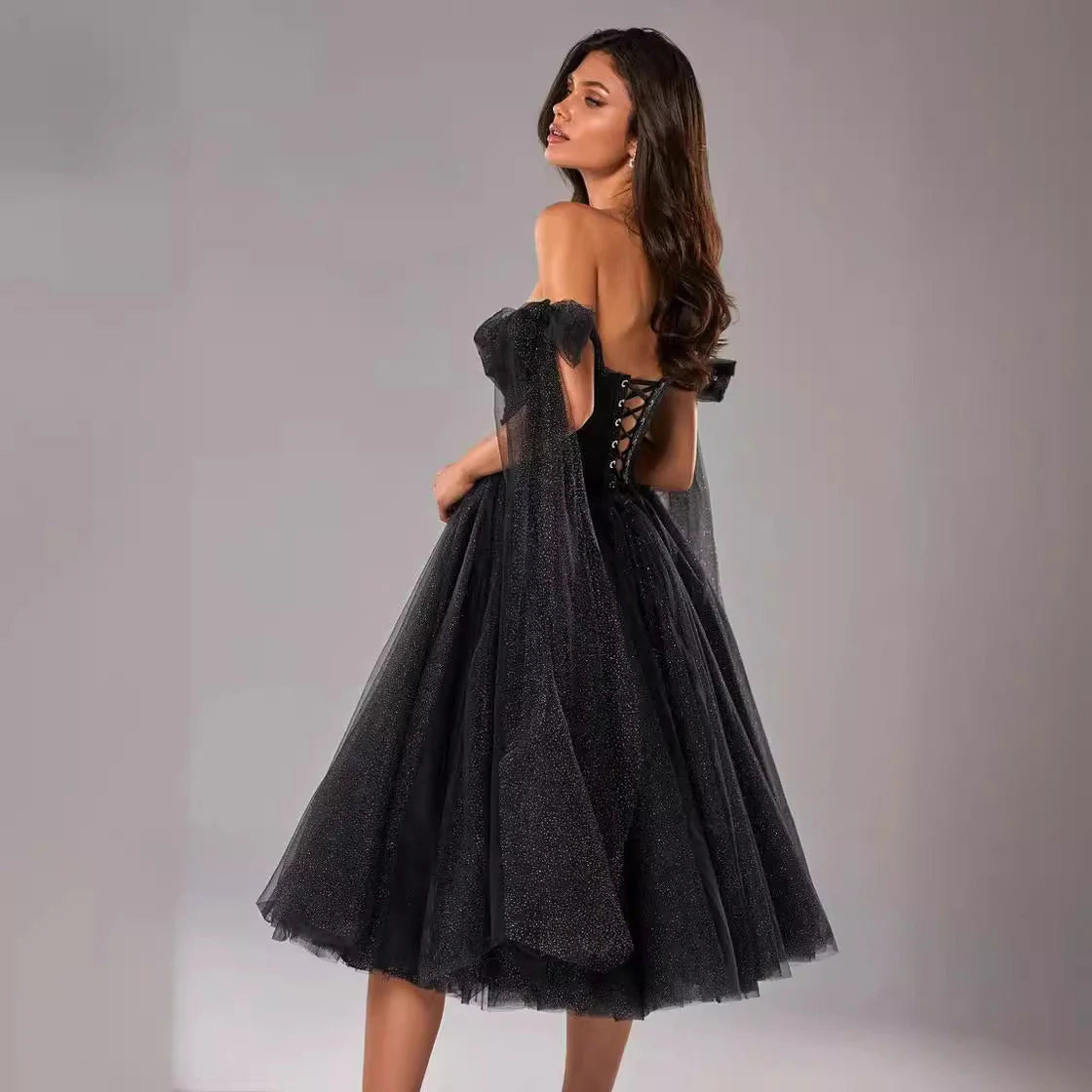 Ladies evening dress – A-line fit – Sheer overlay – Open back – Midi length - Image 2