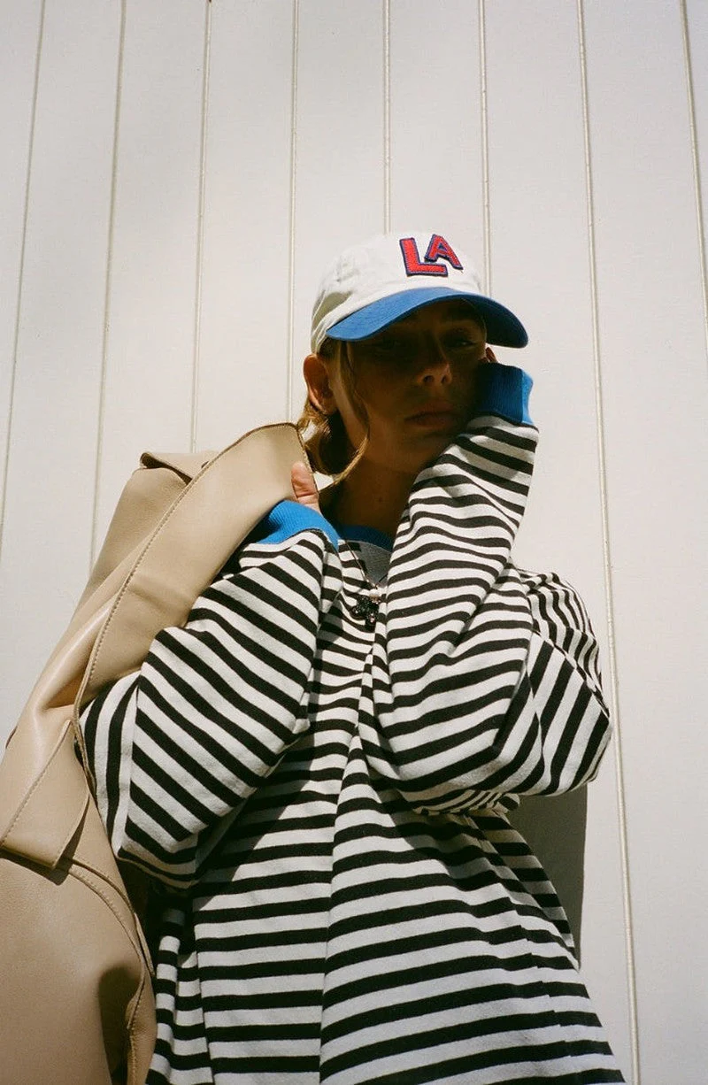 Striped sweater for a modern look - Image 9
